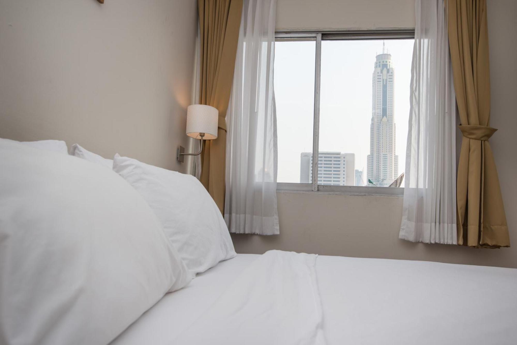 Seasons Siam Hotel Бангкок Номер фото